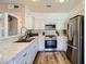 Bright kitchen featuring stainless steel appliances, updated countertops, and ample cabinet space at 251 S Green Valley Pkwy # 3222, Henderson, NV 89012