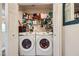 Laundry closet equipped with two Samsung front-load washing machines at 251 S Green Valley Pkwy # 3222, Henderson, NV 89012