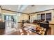 Spacious lounge area featuring a dining table, sitting area and windows with wood shutters at 251 S Green Valley Pkwy # 3222, Henderson, NV 89012