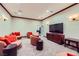 Cozy movie theater with comfortable seating, wall sconces and a large tv at 251 S Green Valley Pkwy # 3222, Henderson, NV 89012
