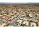 Expansive aerial view of a Sun City Summerlin neighborhood, showcasing the community layout and residential architecture at 2616 Faiss Dr, Las Vegas, NV 89134