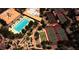 Aerial view showcasing community pool, tennis courts, walking paths, and meticulously kept landscaping at 2616 Faiss Dr, Las Vegas, NV 89134