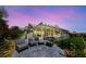 Backyard patio features a full outdoor bar area, stylish seating and views at 2616 Faiss Dr, Las Vegas, NV 89134