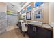 Stylish bathroom with dual vanities, modern fixtures, and bright lighting at 2616 Faiss Dr, Las Vegas, NV 89134
