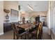 Formal dining room with elegant table, chandelier, and neutral décor, perfect for gatherings at 2616 Faiss Dr, Las Vegas, NV 89134