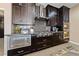 Well-equipped kitchen featuring stainless steel appliances, custom cabinetry, and a gas range at 2616 Faiss Dr, Las Vegas, NV 89134