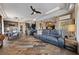 Spacious living room showcasing the stylish floors, a coffered ceiling, and an open layout to the kitchen at 2616 Faiss Dr, Las Vegas, NV 89134