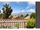 Beautiful mountain view through the trees, from this lovely homes exterior at 2616 Faiss Dr, Las Vegas, NV 89134