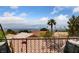 Incredible mountain view from the balcony, with tile roof and blue skies at 2616 Faiss Dr, Las Vegas, NV 89134