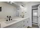 Bathroom boasts double sinks with modern fixtures and a glass-enclosed shower at 2725 S Nellis Blvd # 2036, Las Vegas, NV 89121