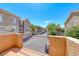 Charming balcony view overlooking a well-maintained street and neighboring townhomes on a clear sunny day at 2766 Red Vista Ct, Henderson, NV 89074