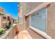 A cozy balcony view showing the exterior of the building and the lush desert landscaping at 2766 Red Vista Ct, Henderson, NV 89074