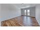 Bedroom with laminate floors and sliding glass doors to a balcony at 2766 Red Vista Ct, Henderson, NV 89074