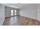 Bedroom with wood floors and a sliding glass door to a balcony at 2766 Red Vista Ct, Henderson, NV 89074