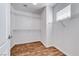 Spacious walk-in closet featuring wood-look floors and multiple wire storage shelves at 2766 Red Vista Ct, Henderson, NV 89074