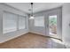 Bright dining area with pendant lighting, large windows and tile floors at 2766 Red Vista Ct, Henderson, NV 89074