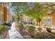 Landscaped grounds and walkways are well maintained in this exterior street view at 2766 Red Vista Ct, Henderson, NV 89074