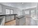 Kitchen featuring granite countertops, a center island, and stainless steel appliances at 2766 Red Vista Ct, Henderson, NV 89074