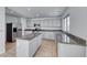 Modern kitchen showcasing stainless steel appliances, a granite countertop island and ample storage space at 2766 Red Vista Ct, Henderson, NV 89074
