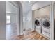 Convenient laundry closet with modern washer and dryer units in a modern home at 2766 Red Vista Ct, Henderson, NV 89074
