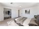 Staged bedroom with hardwood floors, ample closet space, and neutral decor at 2854 La Canada St, Las Vegas, NV 89169