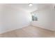 This bright bedroom has new wood floors, base molding and a view from the window at 2854 La Canada St, Las Vegas, NV 89169