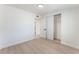 A bright bedroom with natural light with wood floors and a closet with sliding doors at 2854 La Canada St, Las Vegas, NV 89169