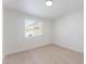 This bedroom is bright with natural light, wood flooring, and has a window at 2854 La Canada St, Las Vegas, NV 89169