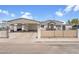 Charming single-story home featuring a carport, gated front yard, and desert landscaping at 2854 La Canada St, Las Vegas, NV 89169