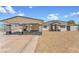 Charming single-story home featuring a carport, gated front yard, and desert landscaping at 2854 La Canada St, Las Vegas, NV 89169