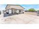Charming single-story home featuring a carport, gated front yard, and desert landscaping at 2854 La Canada St, Las Vegas, NV 89169