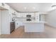 Spacious kitchen with white cabinets, stainless steel appliances, and stone countertops for modern appeal at 2854 La Canada St, Las Vegas, NV 89169