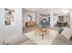 Open concept living room flows into kitchen with eat-in island, modern decor and stylish finishes at 2854 La Canada St, Las Vegas, NV 89169