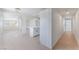 Spacious, bright open floorplan offers versatility and natural light; hallway leads to bedrooms at 2854 La Canada St, Las Vegas, NV 89169