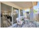 Comfortable balcony with two chairs, a small table, and views of the neighborhood at 3125 N Buffalo Dr # 1133, Las Vegas, NV 89128