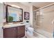 Bathroom featuring tile floors, a shower with a glass enclosure, and a large vanity at 3125 N Buffalo Dr # 1133, Las Vegas, NV 89128