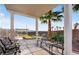 Relaxing patio area with seating overlooking the green space at 3125 N Buffalo Dr # 1133, Las Vegas, NV 89128