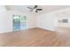 Bright and airy living room with a sliding glass door providing access to the outside and lots of natural light at 3320 Osage Ave, Las Vegas, NV 89101