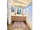Bright bathroom features double sinks with a decorative rug and full mirror at 39 Belle La Blanc Ave, Las Vegas, NV 89123