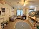 A bedroom features a sofa, chair, dresser, play kitchen, bunk beds, and round striped rug at 39 Belle La Blanc Ave, Las Vegas, NV 89123