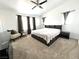Bright bedroom with neutral color palette, plush carpet, and contemporary furnishings at 39 Belle La Blanc Ave, Las Vegas, NV 89123