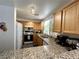 Spacious kitchen features wood cabinets, stainless appliances and granite countertops at 39 Belle La Blanc Ave, Las Vegas, NV 89123