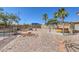 Backyard features a pool, hot tub, storage shed, and rock landscaping at 4010 Hemphill St, North Las Vegas, NV 89032