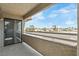 View of the community from the home's private balcony, which features a sliding glass door at 5038 S Rainbow Blvd # 206, Las Vegas, NV 89118