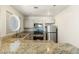 Updated kitchen featuring granite countertops and stainless steel appliances at 5038 S Rainbow Blvd # 206, Las Vegas, NV 89118