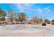 Recreation area featuring a play structure and park benches at 5121 Backwoodsman Ave, Las Vegas, NV 89130