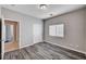 Bedroom with hard surface floors, closet and doorway at 525 Sun Mountain Ave, North Las Vegas, NV 89031