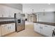 Spacious kitchen featuring stainless steel refrigerator and granite countertops at 525 Sun Mountain Ave, North Las Vegas, NV 89031
