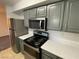 Close-up of a kitchen featuring stainless steel appliances and ample counter space at 555 E Silverado Ranch Blvd # 2030, Las Vegas, NV 89183