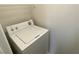 Laundry room includes a white washing machine at 555 E Silverado Ranch Blvd # 2030, Las Vegas, NV 89183